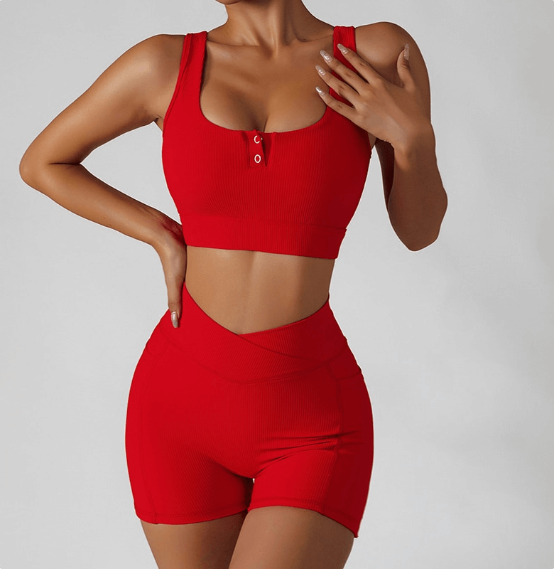 Stylish red elastic women's sports cropped top with breathable material, perfect for yoga and active movement.
